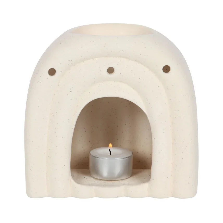 Crème kleurige keramische geurbrander met waxinelichtje voor aromatherapie en zen sfeer