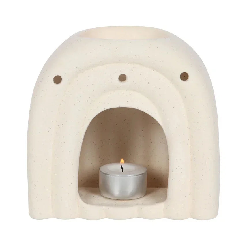 Crème kleurige keramische geurbrander met waxinelichtje voor aromatherapie en zen sfeer