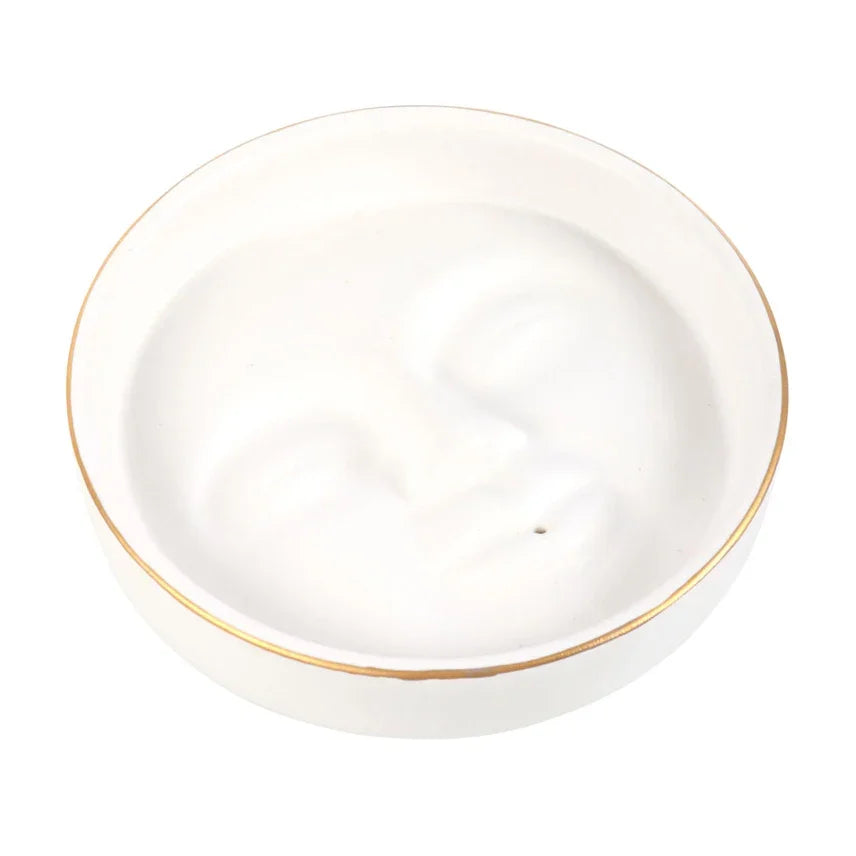 Witte keramische sieradenschaal met gezicht en gouden rand, meditatie woonaccessoire