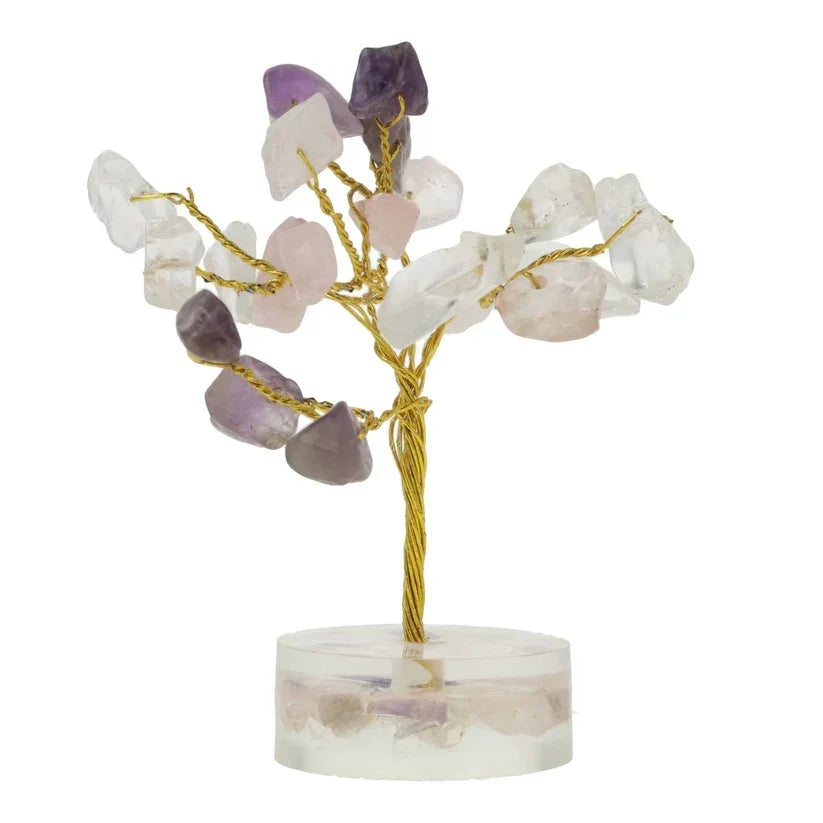 Decoratieve kristallen boom met amethist en rozenkwarts op een transparante voet
