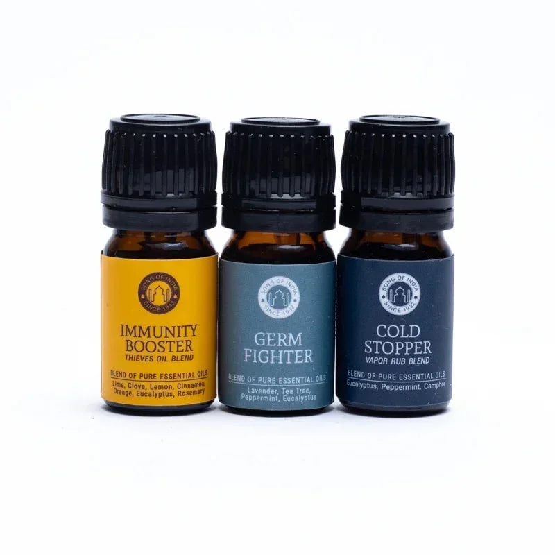 Drie flesjes etherische olie blends: Immunity Booster, Germ Fighter en Cold Stopper.