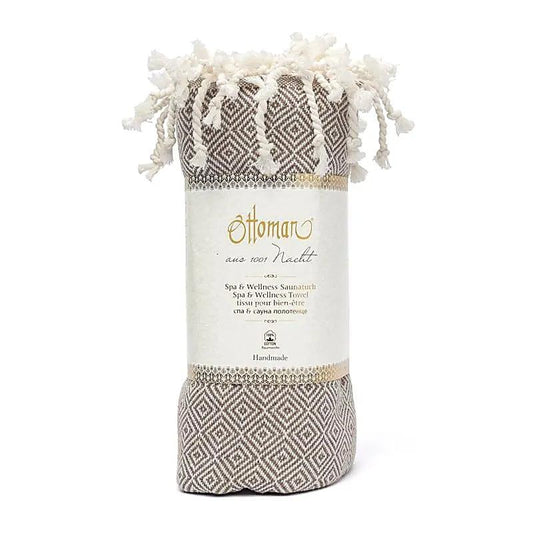 Handgeweven bruine hamamdoek met wit patroon en franjes, spa wellness handdoek.