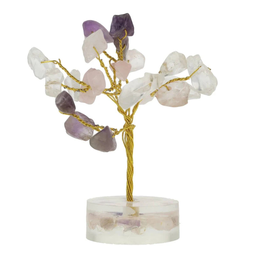 Decoratieve kristallen boom met amethist en rozenkwarts op een transparante voet