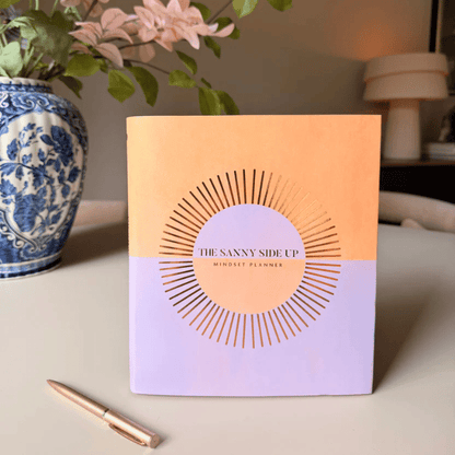 The Sanny Side Up mindset planner met zonnestraalontwerp, perfect voor zelfzorg en dagelijkse planning